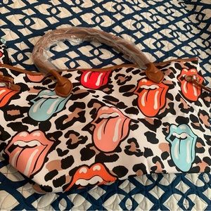 NWT Rolling Stones Handbag and change purse
